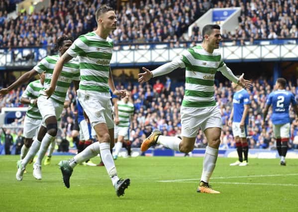 Tom Rogic celebrates after opening the scoring at Ibrox. Picture: SNS/Bill Murray