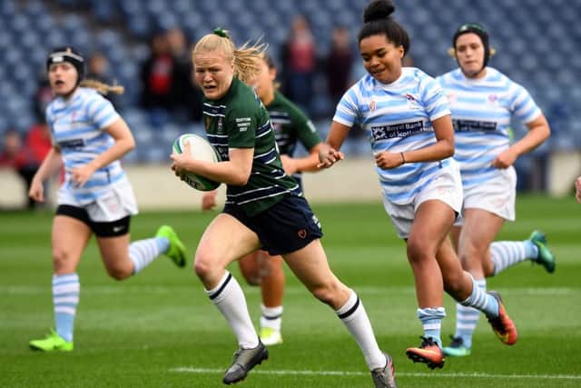 Edinburgh's Elizabeth Musgrove breaks away to score a try. Picture: Ross Parker/SNS