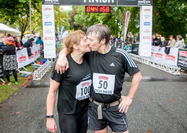 Sarah-Louise Grigor and Chris Cull complete the Baxters Loch Ness Marathon ahead of their wedding immediately after the race.

Picture: Paul Campbell.