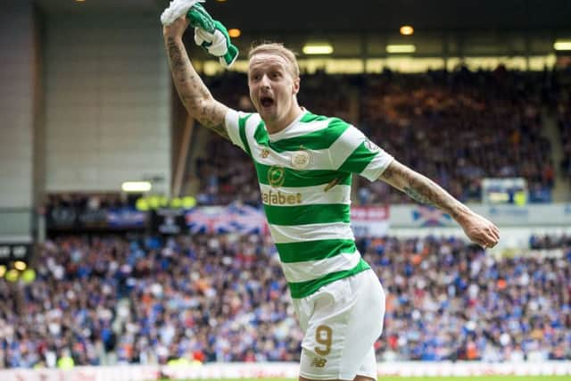 Leigh Griffiths celebrates his goal at Ibrox - but the irrepressible striker has been told to 'grow up'. Picture: SNS Group