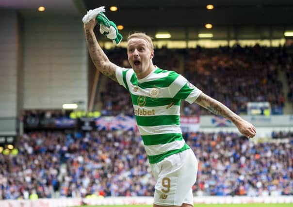 Leigh Griffiths celebrates his goal at Ibrox - but the irrepressible striker has been told to 'grow up'. Picture: SNS Group