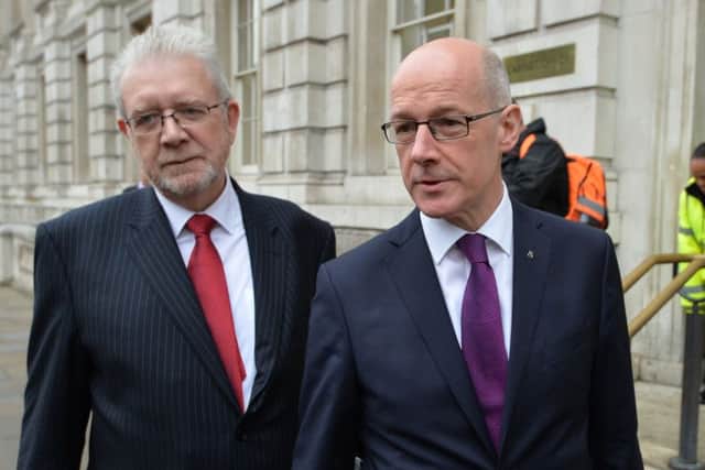 Scottish Deputy First Minister John Swinney (right) and Brexit minister Mike Russell arriving to meet First Secretary of State Damian Green. Picture: John Stillwell/PA Wire