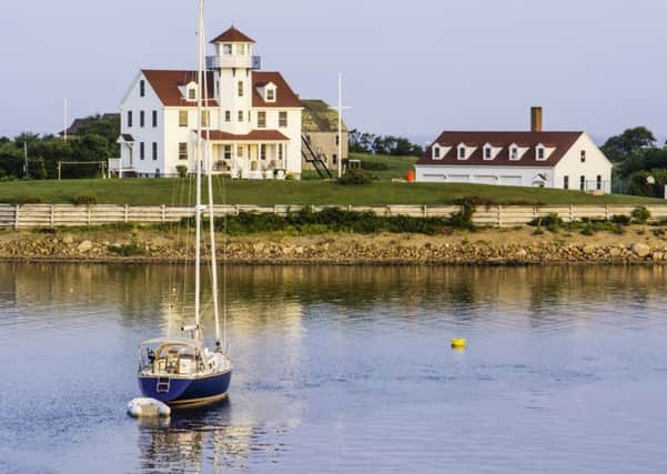 Yacht anchored near Coast Guard station at Block Island, Rhode Island, shortly after sunrise. Picture: Getty Images