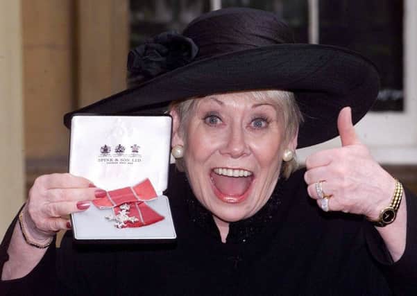 Liz Dawn pictured at Buckingham Palace in 2000 after receiving her MBE. Picture: PA