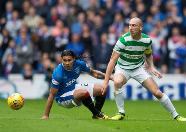 Scott Brown, right, is the lynchpin of the Celtic midfield. Picture: PA