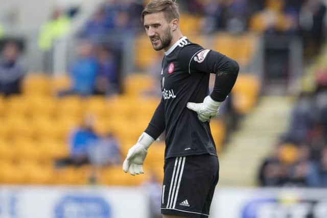 Gary Woods was forced off early in the second half at McDiarmid Park. Picture: SNS Group