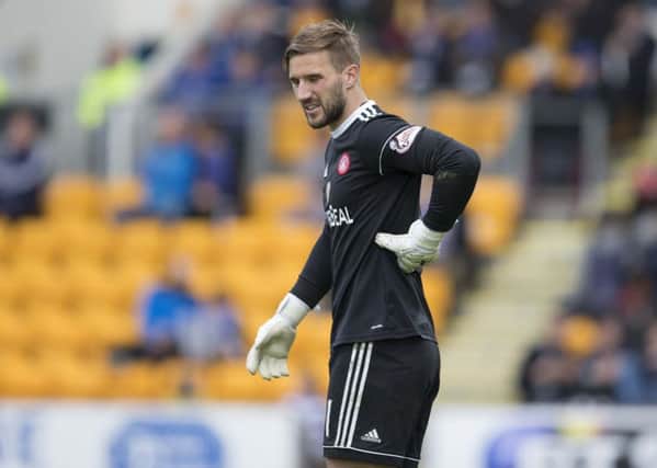 Gary Woods was forced off early in the second half at McDiarmid Park. Picture: SNS Group