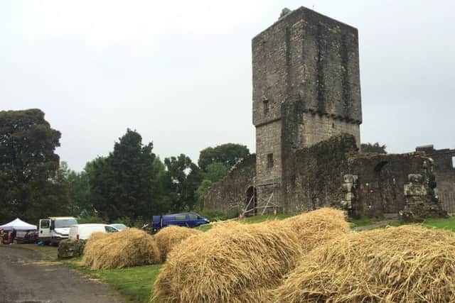 The big Budget Netflix production of Outlaw King, starring Chris Pine, has built a 10 house thatched village at the foot of Mugdock Castle. Picture: SWNS