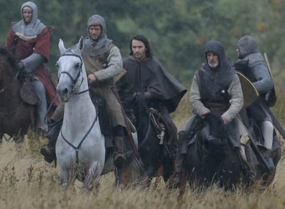 First day of filming in an estate outside Linlithgow, Scotland, of Netflix film outlaw King about Robert the Bruce. August 28, 2017. The film stars Chris Pine and is directed by Scot David Mackenzie (pictured) and also stars Monarch of the Glen actor Alastair McKenzie,(pictured) who was seen on set today along with the director.