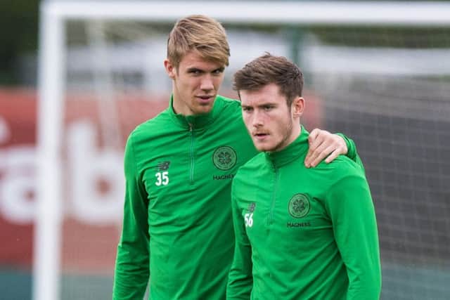 Anthony Ralston (right), seen here with Kristoffer Ajer, has a slight knee injury but will be fit to face Hibs on Saturday. Picture: SNS Group