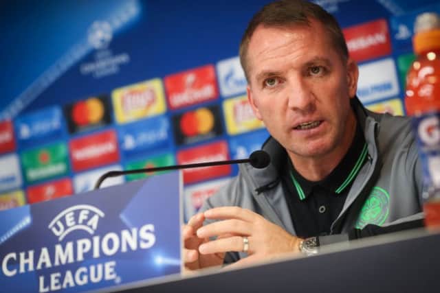 Celtic manager Brendan Rodgers speaks to the press in Brussels ahead of the Champions League tie with Anderlecht. Picture: Virginie Lefour/AFP/Getty Images