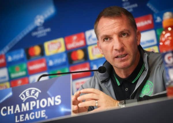 Celtic manager Brendan Rodgers speaks to the press in Brussels ahead of the Champions League tie with Anderlecht. Picture: Virginie Lefour/AFP/Getty Images