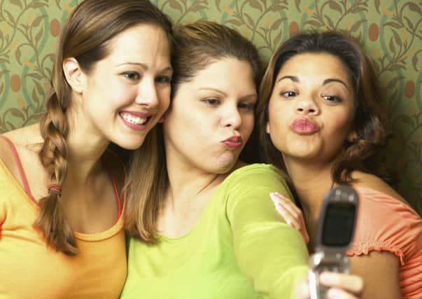 Selfies might bring out the exhibitionist in us, but it's natural to want to be in a picture.