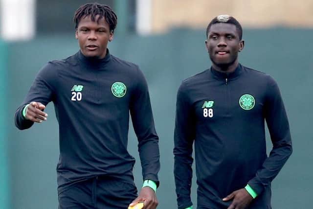 Boyata with Eboue Kouassi during Celtic's final training session at Lennoxtown before flying to Belgium. Picture: PA