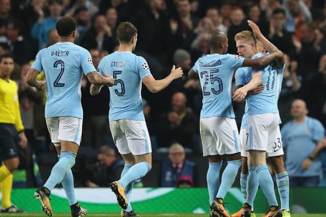 The Manchester City players celebrate Belgian forward Kevin De Bruynes opening goal three minutes into the second half. Picture: Matthew Lewis/Getty Images
