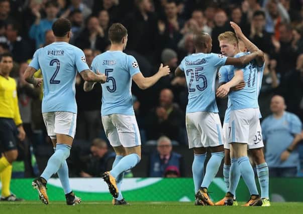 The Manchester City players celebrate Belgian forward Kevin De Bruynes opening goal three minutes into the second half. Picture: Matthew Lewis/Getty Images