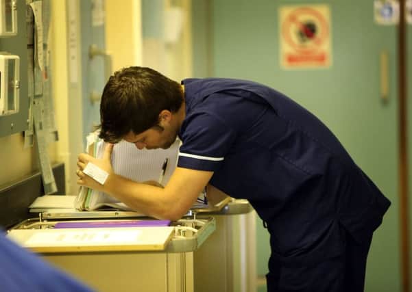 Male nurses are under-represented in the NHS. Photograph: Christopher Furlong/Getty