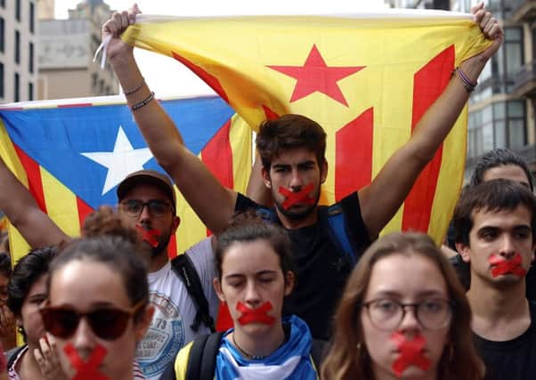Catalans stage a silent demonstration after the violence of the independence referendum. Picture: Getty.