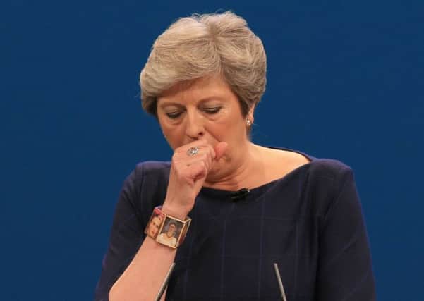Spluttering Theresa May gained some sympathy after her conference speech disaster. Picture: Peter Byrne/PA Wire