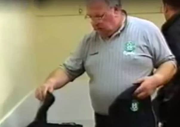 Stills from a documentary on Hibs in 1999 show kit man Jim McCafferty laying out shirts before a match