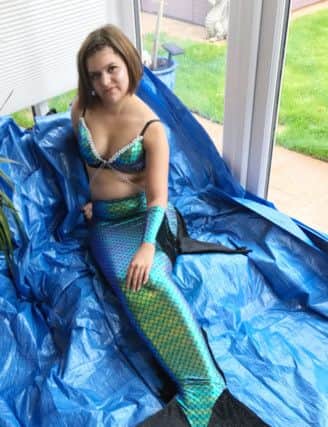 Leia Trigger, a would-be "mermaid", has been left high-and-dry by a ban at her local pool. Picture: Handout/PA