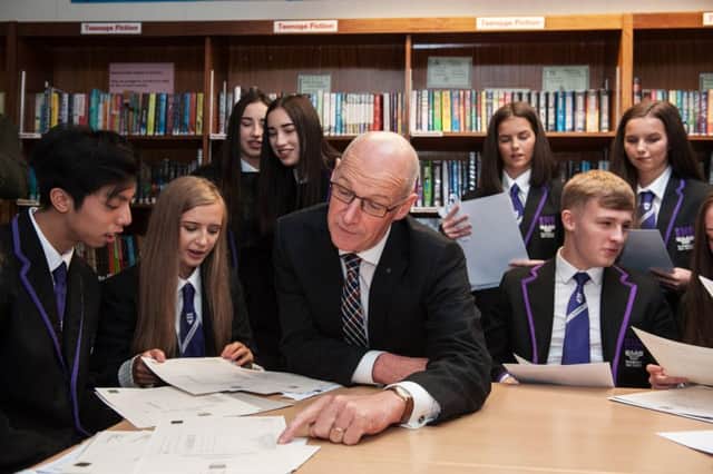John Swinney has struck a deal with local authorities over his plan to set up regional bodies to support school improvement. Picture: John Devlin