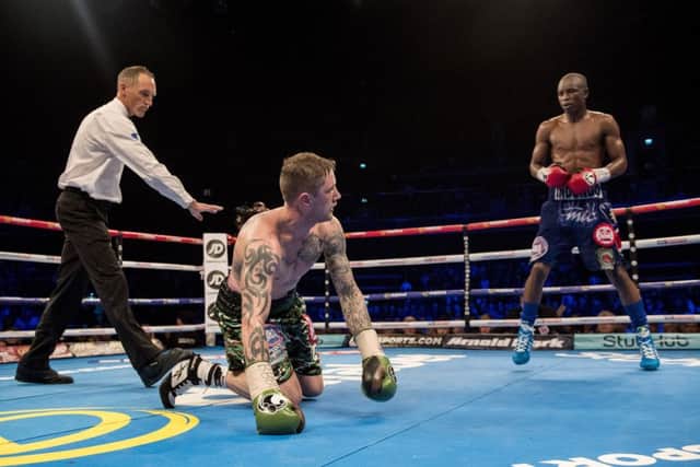 Ricky Burns is floored by Julius Ibdongo last time out  he is now hoping to rekindle his world title hopes. Photograph: SNS