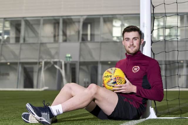 Hearts defender John Souttar is keen to keep learning under Craig Levein, inset. Picture: SNS.