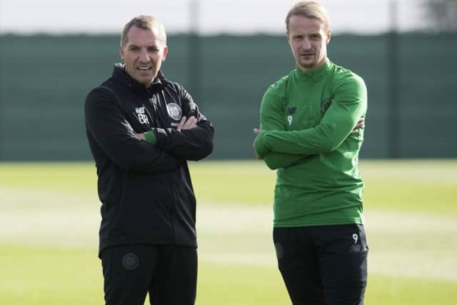 Celtic manager Brendan Rodgers talks to Leigh Griffiths in training. Picture: Craig Foy/SNS