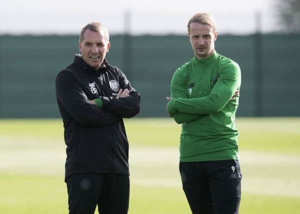 Celtic manager Brendan Rodgers talks to Leigh Griffiths in training. Picture: Craig Foy/SNS