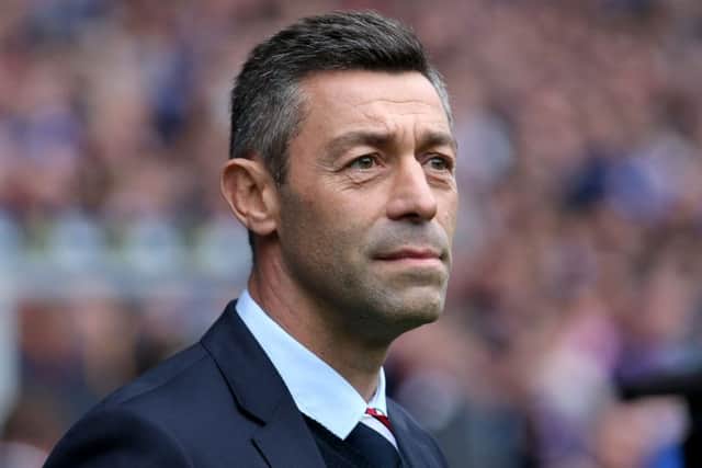 Pedro Caixinha said that Kenny Miller 'is one of ours' when asked about the striker's future at Ibrox. Picture: PA