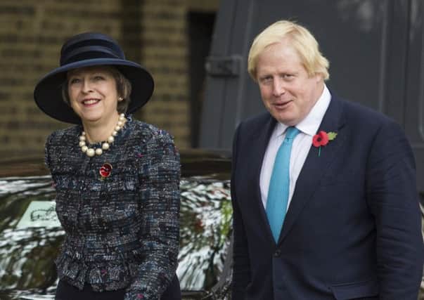 Theresa May is powerless to sack openly rebellious ministers, such as foreign secretary Boris Johnson. Picture: Getty Images