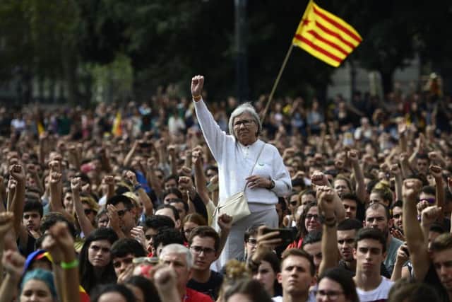Protestors young and old took to the streets of Barcelona in a show of defiance after the police crackdown on voting in the disputed referendum. Picture: AFP/Getty Images