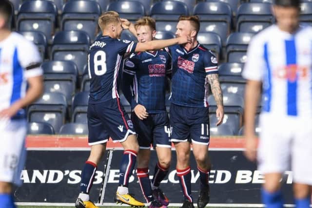 Craig Curran celebrates his opener for Ross County. Picture: SNS Group