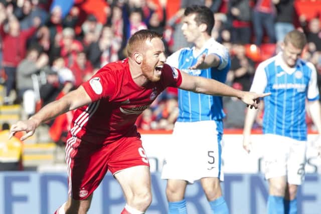 Adam Rooney bagged a hat-trick as Aberdeen maintained their unbeaten start to the league. Picture: SNS Group
