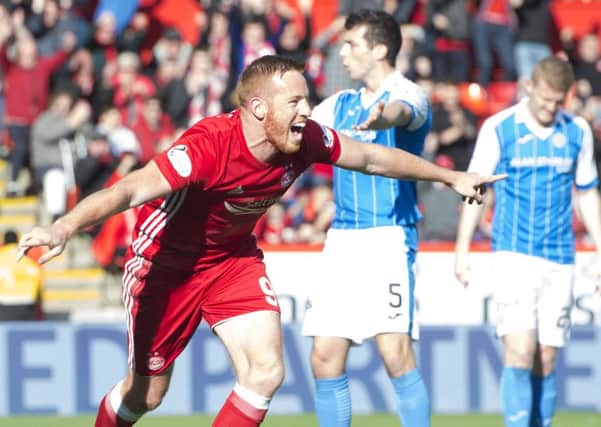 Adam Rooney bagged a hat-trick as Aberdeen maintained their unbeaten start to the league. Picture: SNS Group