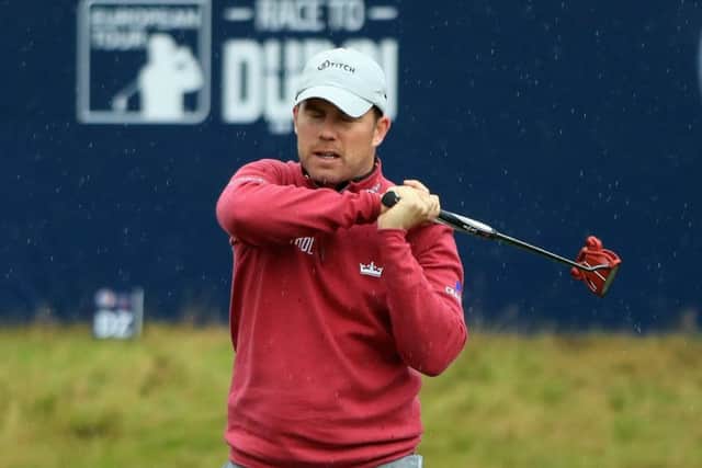 Richie Ramsay reacts after missing a putt on the 18th. Picture: Andrew Redington/Getty Images