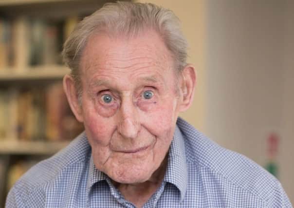 Veteran Ernest Beesley holding his medals while celebrating his 100th birthday. Picture: PA