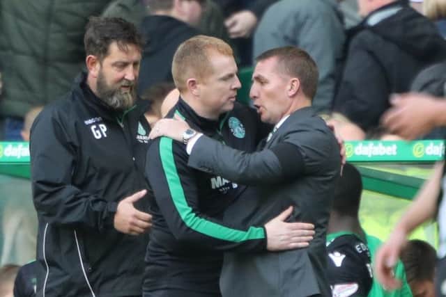 Celtic manager Brendan Rodgers embraces Hibs manager Neil Lennon after the two teams shared the points at Parkhead. Picture: PA