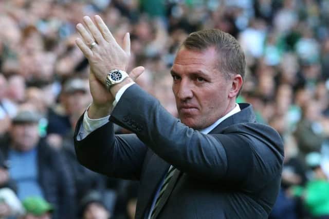 Brendan Rodgers salutes the Celtic fans after the 2-2 draw with Hibs. Picture: PA