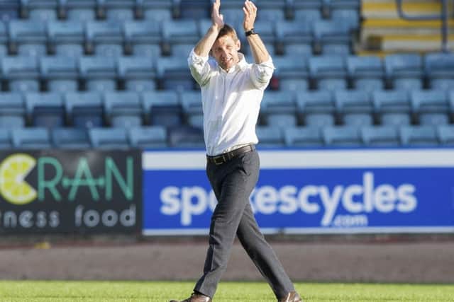 Joy for Neil McCann who applauds the home fans at full time. Picture: SNS Group
