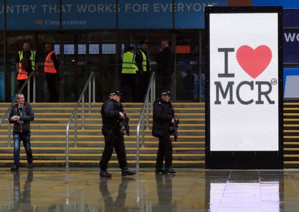 Armed police at the Conservative Party Conference at Manchester Central. Picture: PA