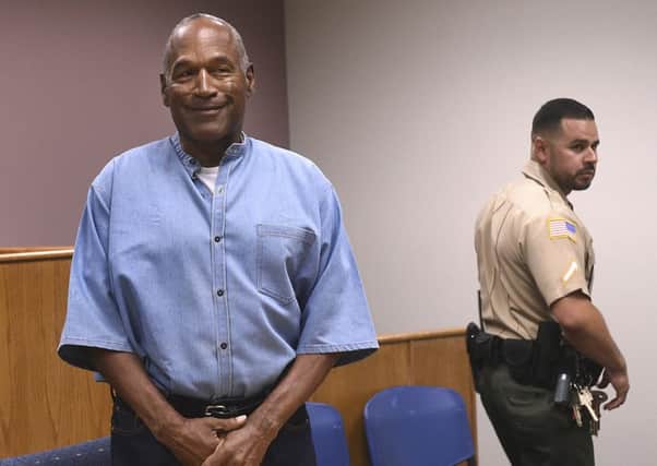 Former NFL football star O.J. Simpson enters for his parole hearing at the Lovelock Correctional Center in Lovelock, Nevada. Picture: Jason Bean/The Reno Gazette-Journal via AP