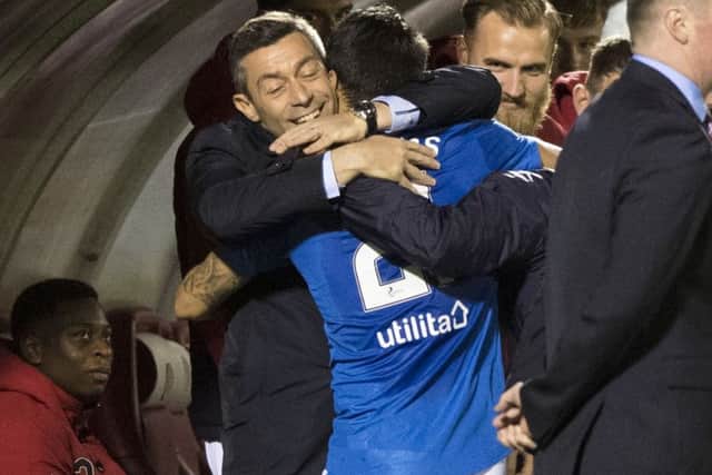 Pedro Caixinha celebrates with Daniel Candeias on Friday. Picture: SNS.