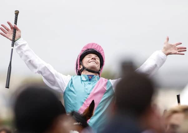 Frankie Dettori celebrates after riding Enable to Arc victory. Picture: Getty.
