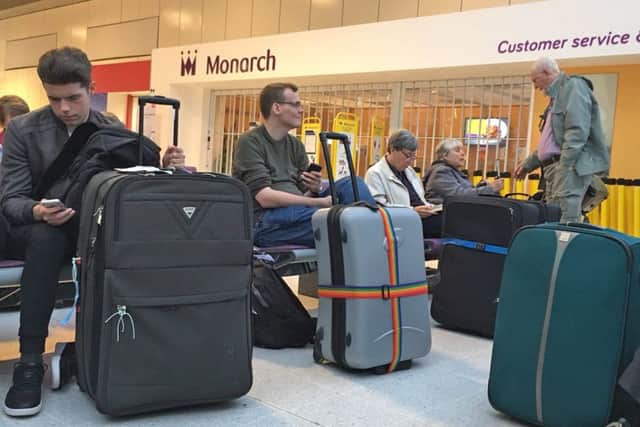 Monarch airline's customer service and ticket sale shut down at Manchester Airport with passengers waiting outside left with no flights. Picture: SWNS