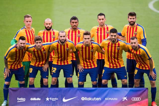 Barcelona's players emerged for the pre-match warm-up wearing shirts in the colours of the Catalan flag ahead of their match with Las Palmas. Picture: Getty Images