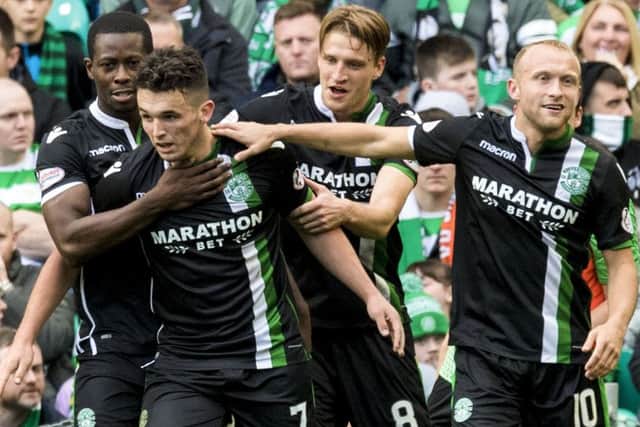 John McGinn celebrates his second goal at Parkhead. Picture: SNS Group