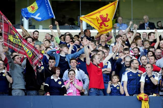 Scotland fans at the clash with England. But Hampden won't be a sell-out for the crunch match with Slovakia. Picture: Michael Gillen