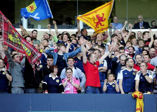 Scotland fans at the clash with England. But Hampden won't be a sell-out for the crunch match with Slovakia. Picture: Michael Gillen